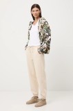 Medicine pantaloni de trening culoarea bej, neted