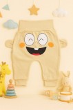 Cumpara ieftin Pantaloni crem bebe cu imprimeu vesel &ndash; model confortabil din bumbac (Marime
