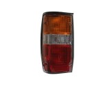 Lampa spate MITSUBISHI L200, 10.1986-11.1996, partea stanga, DEPO, negru rim; cu soclu bec,