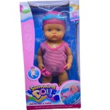 Bebelus fetita de jucarie care inoata