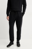 On pantaloni de trening Studio culoarea negru, neted, 1MF11810553