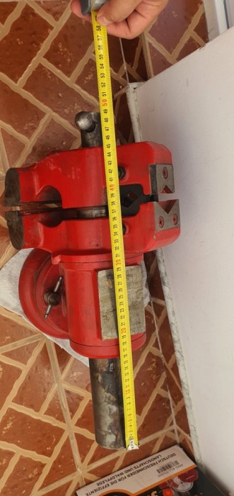 Menghină cu cap rotativ