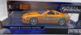Macheta metal Toyota Supra fast and furious cu figurina 1:24