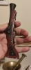 Bricheta masa tip pistol, Cu gaz
