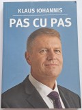 Iohannis Klaus , Pas cu pas