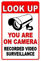 Look up you are on camera recorded video surveillance foto