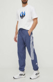 Adidas pantaloni de trening cu imprimeu, IR9239