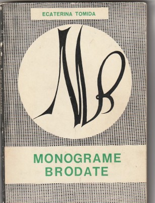 ECATERINA TOMIDA - MONOGRAME BRODATE foto
