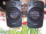 2 boxe-sateliti Logitech (LOGITECH Z906), pot fi folosite la sisteme 2.1, 5.1 sau la microsisteme audio, grele pentru marimea lor, inaltime 10 cm