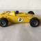 Masinuta Scalex tric C27 Lotus formula 1 curse, plastic, cu frictiune, TRIANG