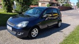 FORD FIESTA 2006 , 1.25 BENZINA, 5 USI, clima,geamuri electrice, computer de bord, roti iarna si vara
