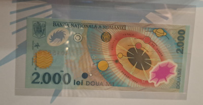 Bancnota cu eclipsa din 1999, seria A0101 foto