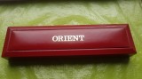 G991-I-Cutie ORIENT pentru ceas, bratara, bijuterii stare buna, material tare vinilat aurit Europa occidentala, lungime 25 cm, 7/3 cm.