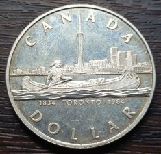 (A634) MONEDA DIN ARGINT CANADA - 1 DOLLAR 1984, 150 ANI TORONTO, CALITATE PROOF foto