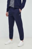 Lacoste pantaloni de trening culoarea albastru marin, melanj