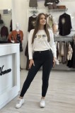 Pantaloni negri din piele ecologica cu catarame pe laterale