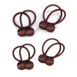 Cumpara ieftin Set 4 magneti decorativi pentru perdele si draperii, tip snur, poliester, 44 cm - Maro inchis