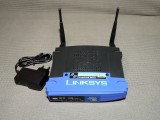 Router wireless Linksys WRT54GL v1.1 cu DD-WRT instalat si modificat pentru card SD