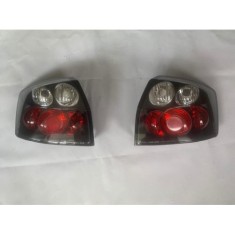 Set stopuri Spate Audi A4 (B6), 11.2000-11.2004, Sedan, partea Stanga+Dreapta, negru, transparent; tuning; Omologare: ECE, Taiwan -ORNAMENT CRAPAT ST