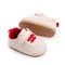 Pantofiori crem cu sireturi rosii pentru baietei (Marime Disponibila: 0-3 luni)