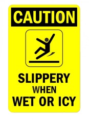Sign caution slippery when wet or icy foto