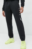 Cumpara ieftin Adidas Originals pantaloni de trening din bumbac barbati, culoarea negru, cu imprimeu