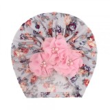 Caciulita tip turban cu floricele roz aplicate (Marime Disponibila: 3-6 luni)