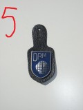 QW8 15 - Insigna - tematica militara - simbol mapamond DRM - suport piele, Europa