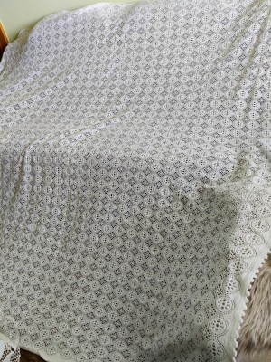 Cuvertură albă din dantelă foto