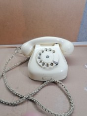 Telefon alb cu disc foto
