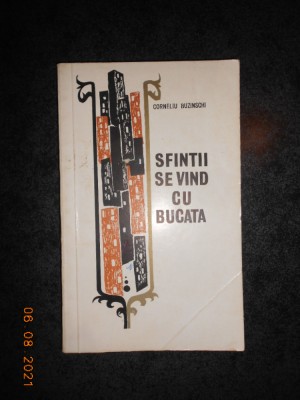 CORNELIU BUZINSCHI - SFINTII SE VAND CU BUCATA foto