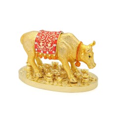 Statueta bivol auriu pe monede si pepite