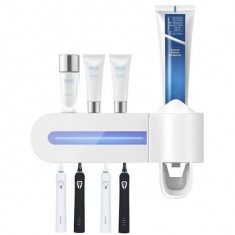 Dozator pentru pasta de dinti cu acumulator si sterilizator UV periute