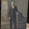 Fotografie tip carte postala, necirculata, tanar cu papion, perioada interbelica