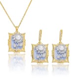 Set bijuterii vintage placate cu aur de 18 K, cu floare-perla si strasuri, Alama