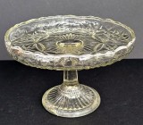 Fructiera vintage de sticla usor galbuie, cu picior si ornamente geometrice, motiv solar anii 70