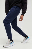 Champion pantaloni de trening culoarea albastru marin, neted