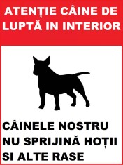 Placuta atentie caine de lupta in interior foto
