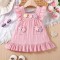 Rochita roz cu floricele crosetate aplicate (Marime Disponibila: 18-24 luni)