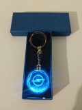 Cumpara ieftin Breloc auto din cristal cu LED - Logo Opel