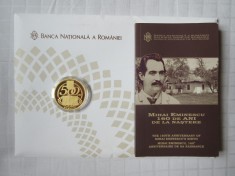 MONEDA AUR BNR M. EMINESCU 160 ANI NASTERE 500 LEI 2010 31.1 GRAME 1 OZ 999 AUR CU PLIANT