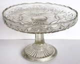 Fructiera vintage de sticla transparenta, cu picior si ornamente geometrice, motiv solar anii 70