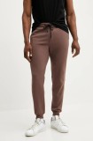 Rip Curl pantaloni de trening culoarea portocaliu, neted