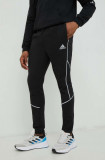 Cumpara ieftin Adidas pantaloni de trening barbati, culoarea negru, cu imprimeu