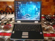 Laptop maxxdata /pentium M 1,73Ghz.ram 1gb /hdd 60gb /acumulator 1,5ore. foto