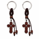 Cumpara ieftin Set 2 brelocuri crestine maro-argintiu 9.5 cm, cruce 4 cm gravata fata, spate metalic, snur impletit cu margele din lemn, inel metalic 2.9 cm diametru