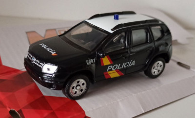 Macheta Dacia Duster 1 Facelift 2014 Politia Spania - Mondo Motors 1/43 foto