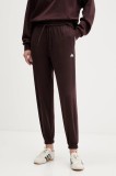 adidas pantaloni de trening Essentials culoarea maro, cu imprimeu, JX3864