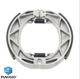 Cumpara ieftin Set saboti frana spate (ferodo) originali Aprilia Scarabeo - Sport City One - Piaggio Fly - Liberty - Vespa Primavera - Sprint 50-100cc