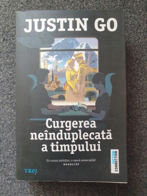 CURGEREA NEINDUPLECATA A TIMPULUI - Justin Go foto